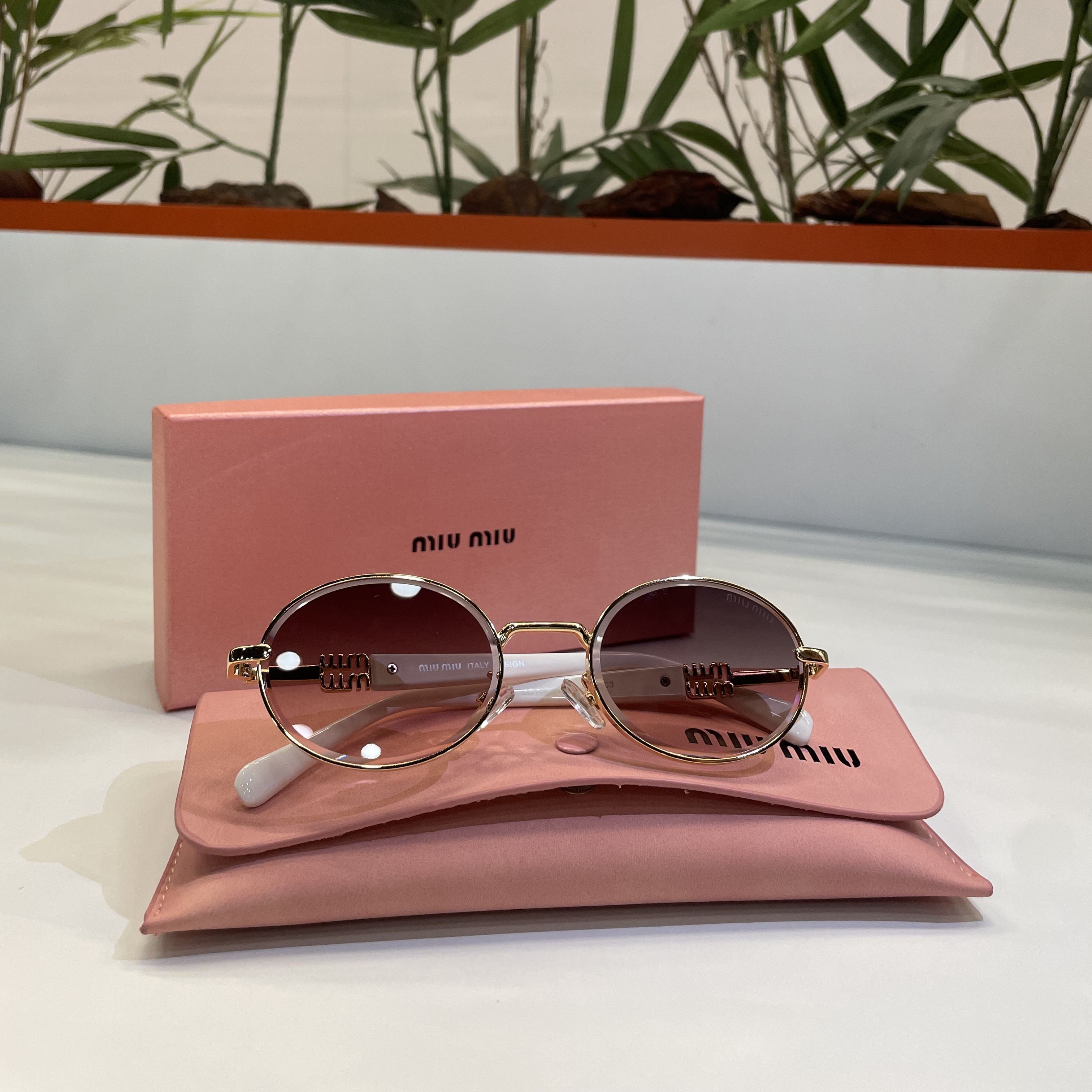 Lunettes Miu Miu Rondes – Monture dorée & verres rosés