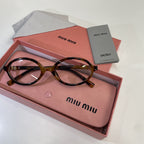 Lunettes Miu Miu transparente