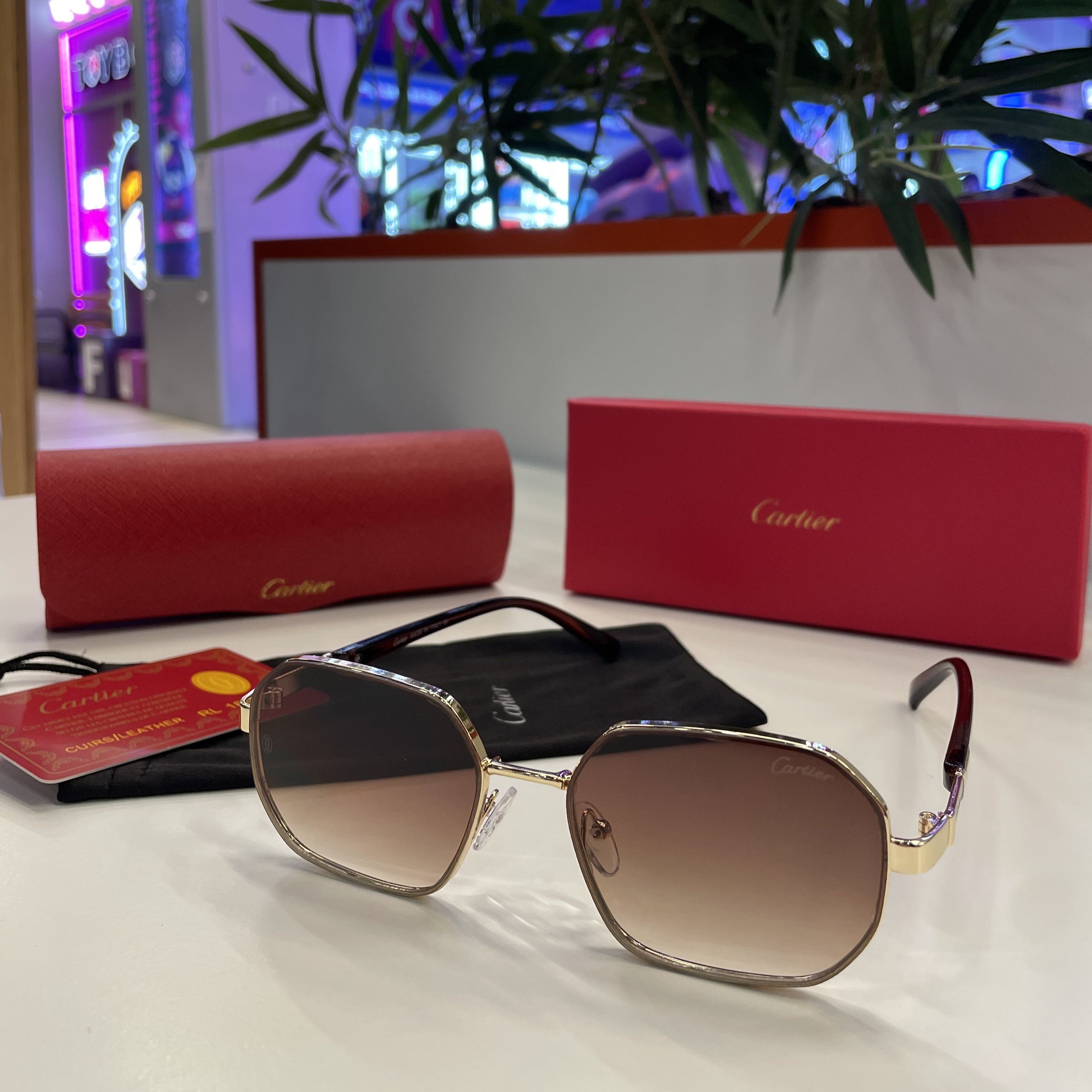 Lunettes Cartier – Monture dorée & verres dégradés marron
