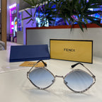 Lunettes Fendi - monture dorée avec verres bleu ciel dégradé