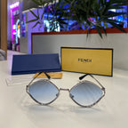 Lunettes Fendi - monture dorée avec verres bleu ciel dégradé