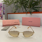 Lunettes MIU MIU Ovales Dorées – Verres Dégradés