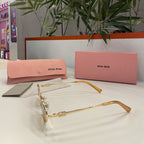 Lunettes MIU MIU Ovales Dorées – Verres Dégradés
