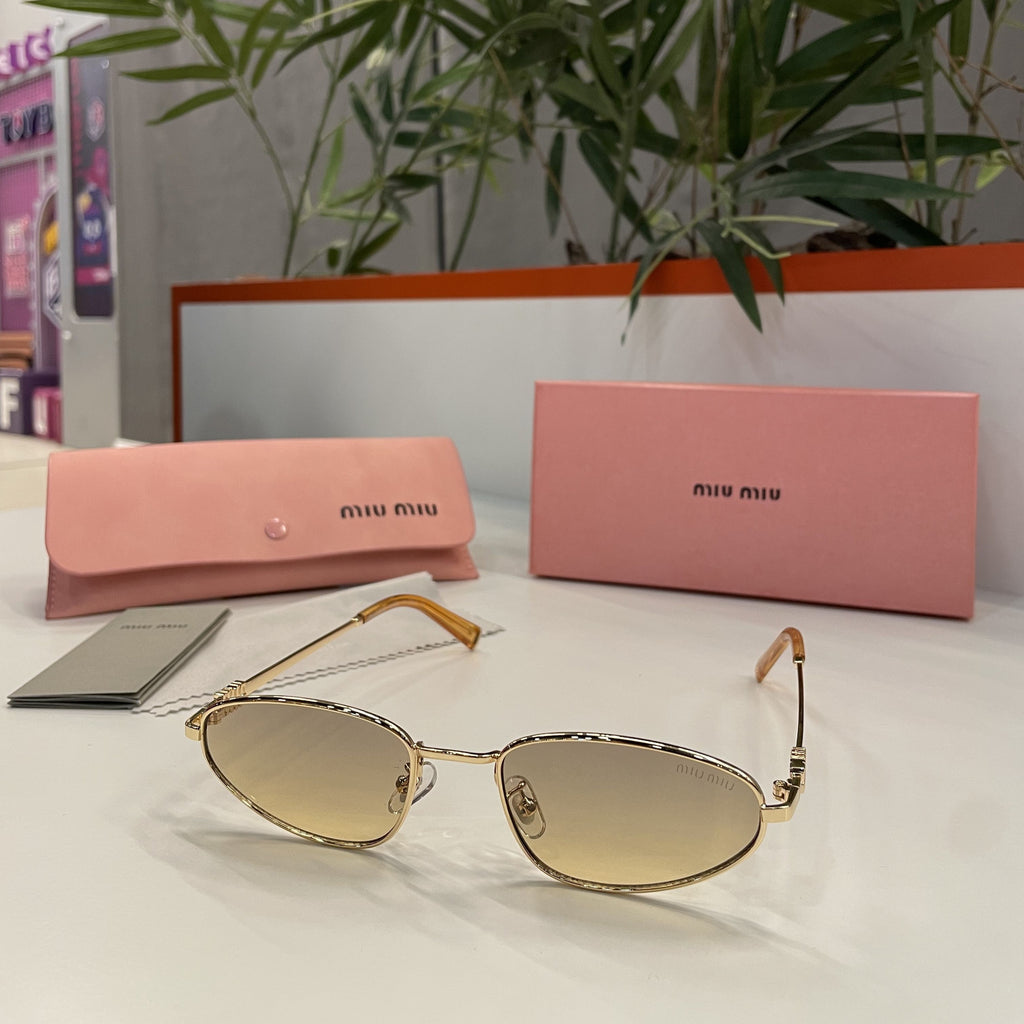 Lunettes MIU MIU Ovales Dorées – Verres Dégradés