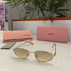 Lunettes MIU MIU Ovales Dorées – Verres Dégradés