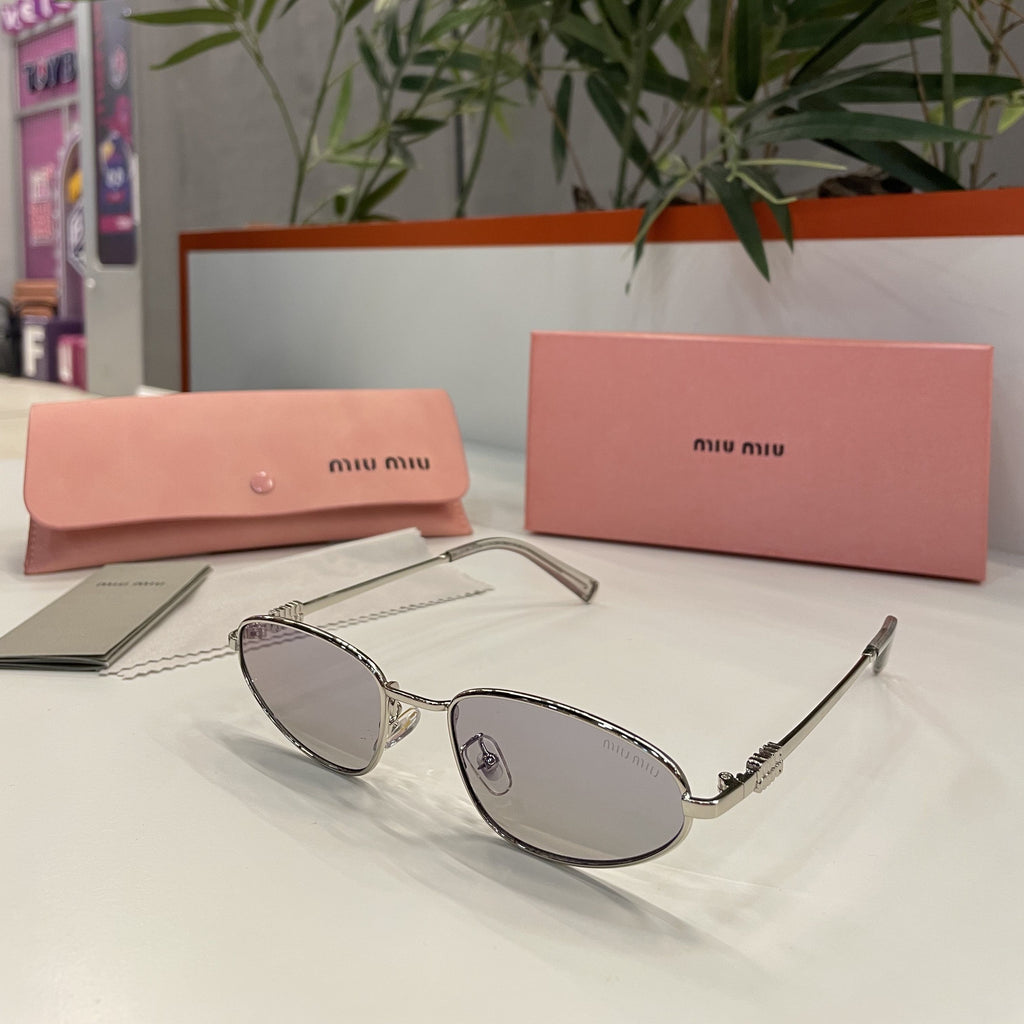 Lunettes Miu Miu Ovales Argentées – Monture Fine & Verres Gris