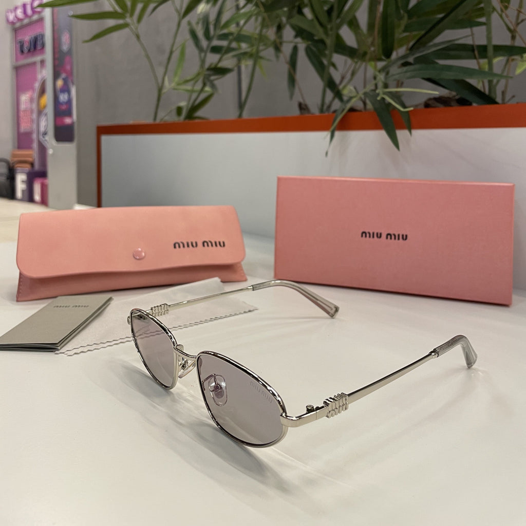 Lunettes Miu Miu Ovales Argentées – Monture Fine & Verres Gris