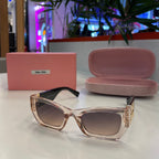 Lunettes Miu Miu Femme – Monture Transparente Rosée & Branches Noires