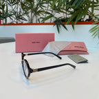Lunettes Miu Miu Noire transparente
