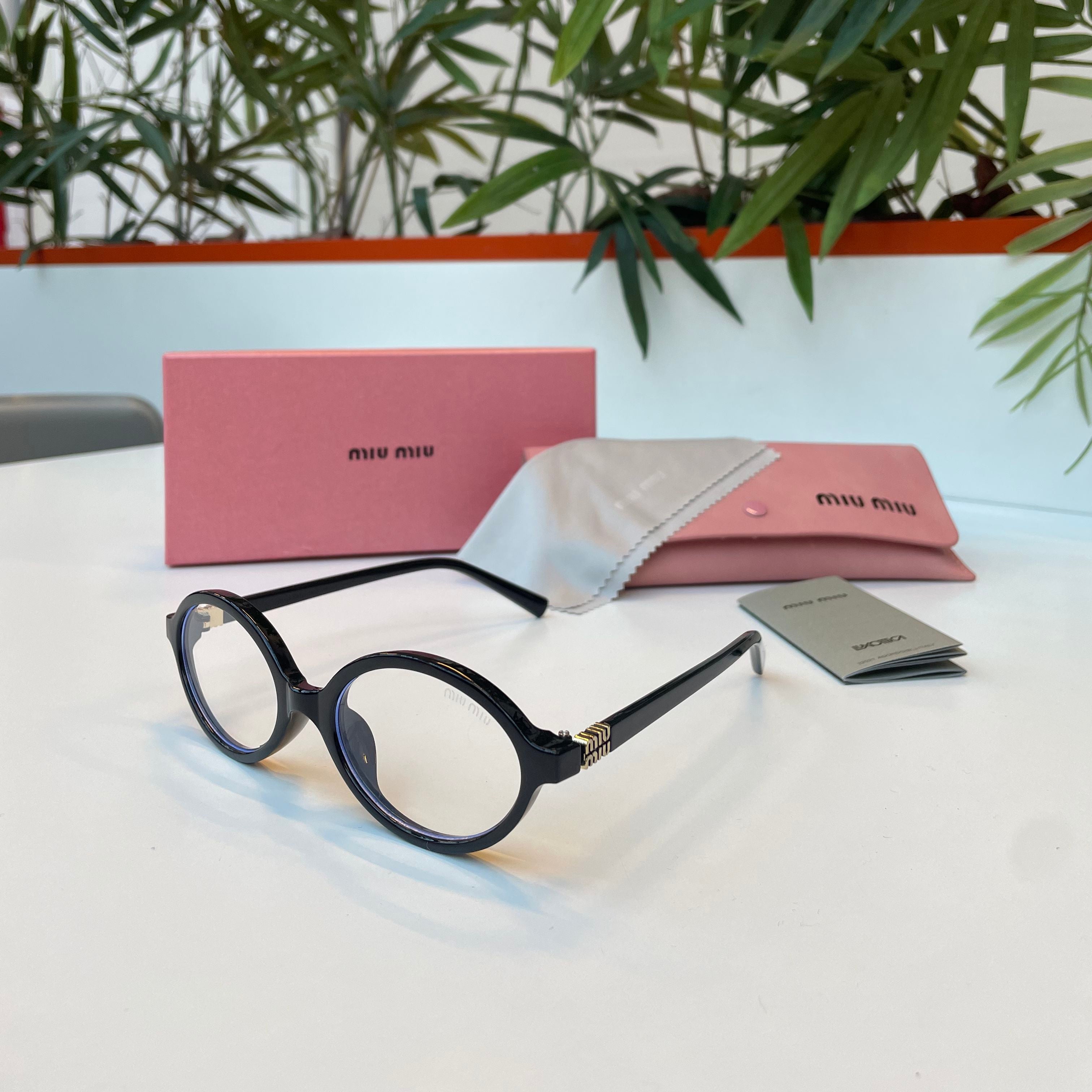 Lunettes Miu Miu Noire transparente